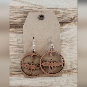 Round wood dragon earrings